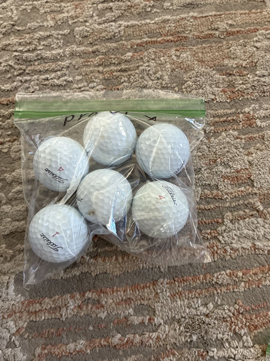 Half dozen pro v1 x golf balls
