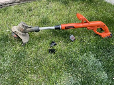 Black and Decker Electric Trimmer with charging cable and battery