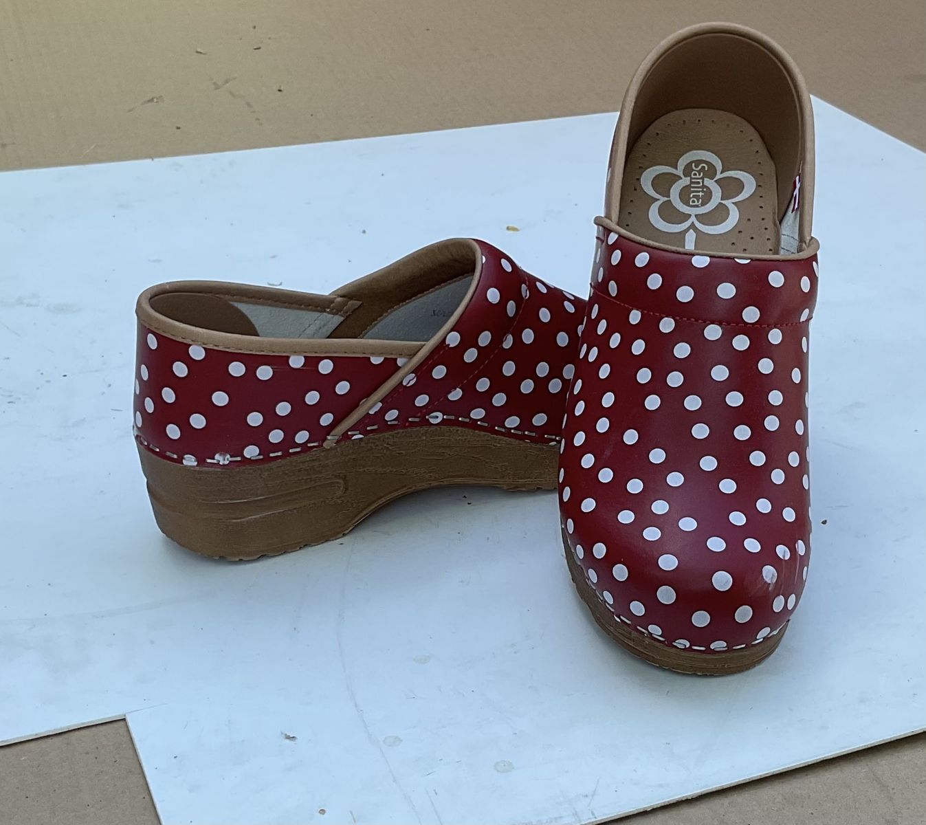 Red and white polkadot clogs