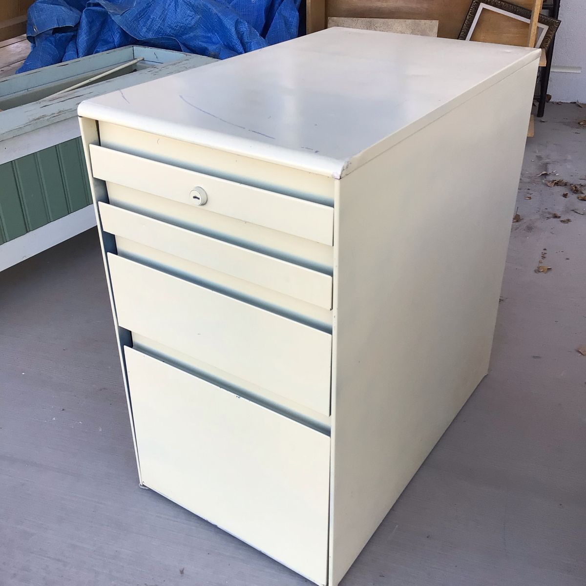 Three Filing Caninets