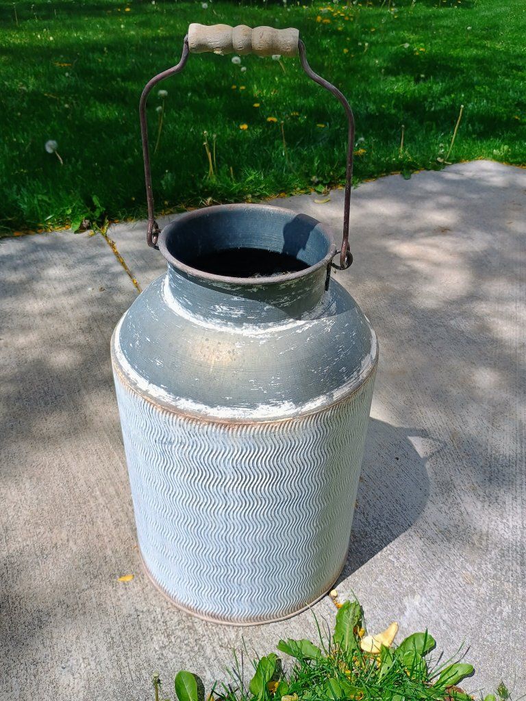 Small Milk can decor. 10 1/2" x 16" tall.