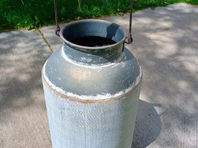 Small Milk can decor. 10 1/2" x 16" tall.