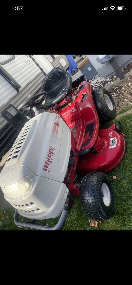 White Horse Riding Lawnmower