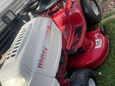 White Horse Riding Lawnmower