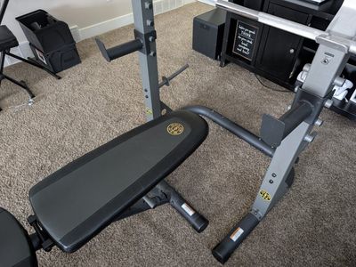 Gold's Gym XRS 20 Olympic Workout Benchand squat rack with Removable Preacher Pad