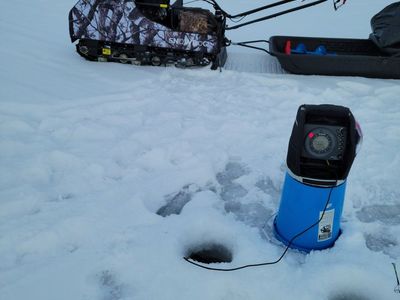 Snowdog Camo Sport Utility Machine with Sled and Ice Fishing Gear