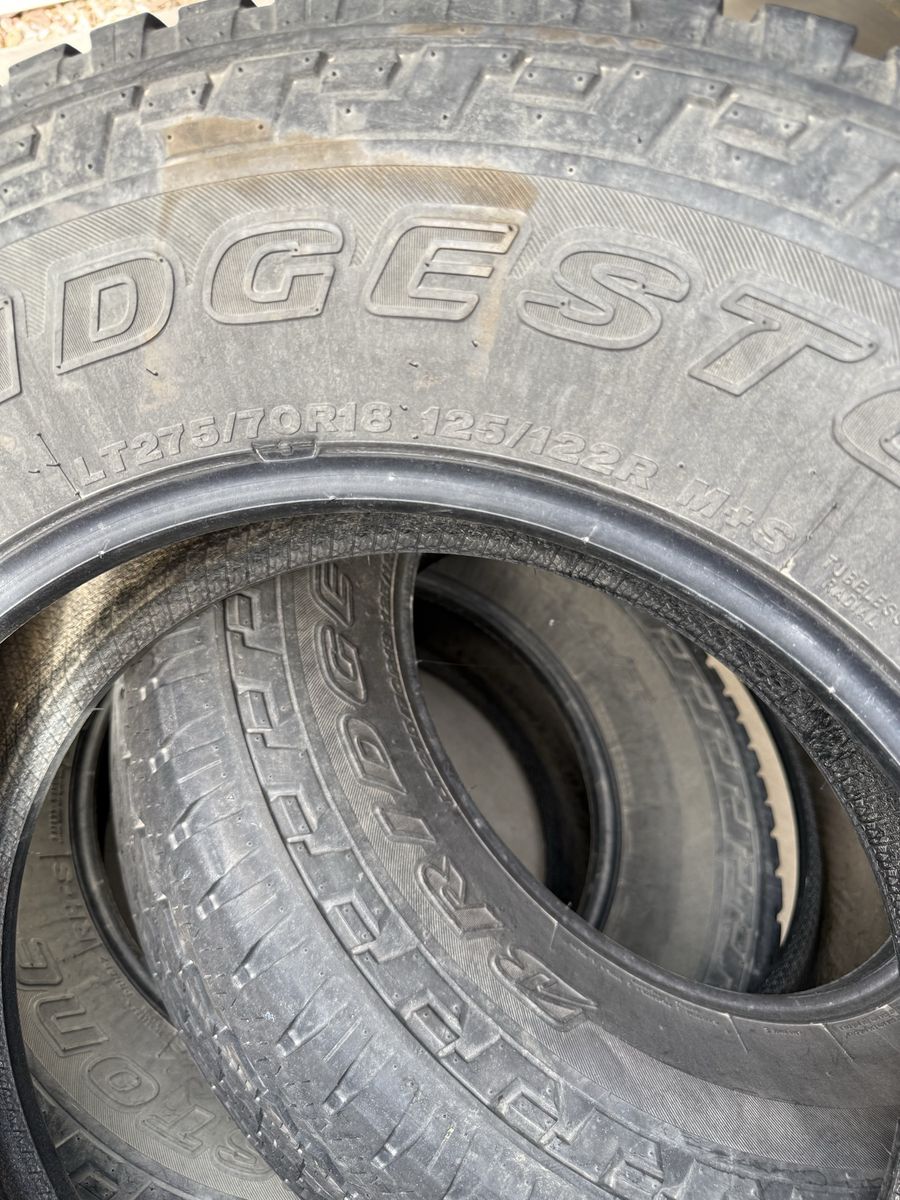 Bridgestone Dueler A/T Revo LT275/70R18 125/122R M+S All-Terrain Tires (Set of 4)