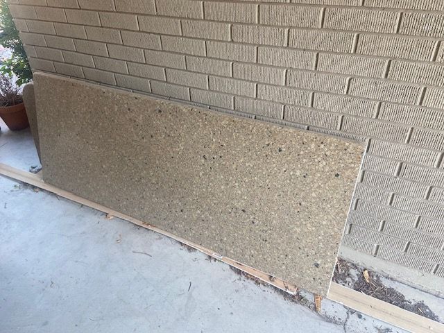 Counter tops of quartz in very good condition.  