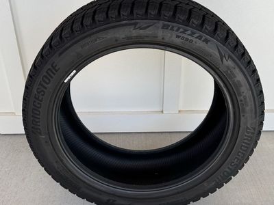 Nearly New - 4 Bridgestone Blizzak WS90 Winter Tires – 235/45R18