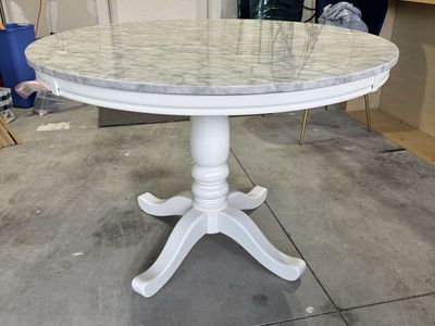 42” faux white marble round dining table.