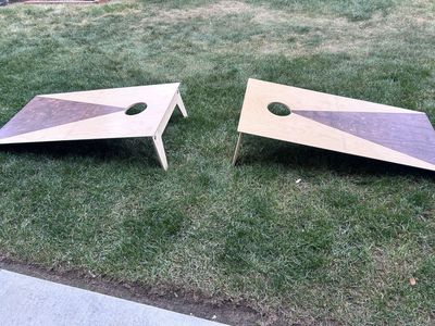 Folding cornhole set
