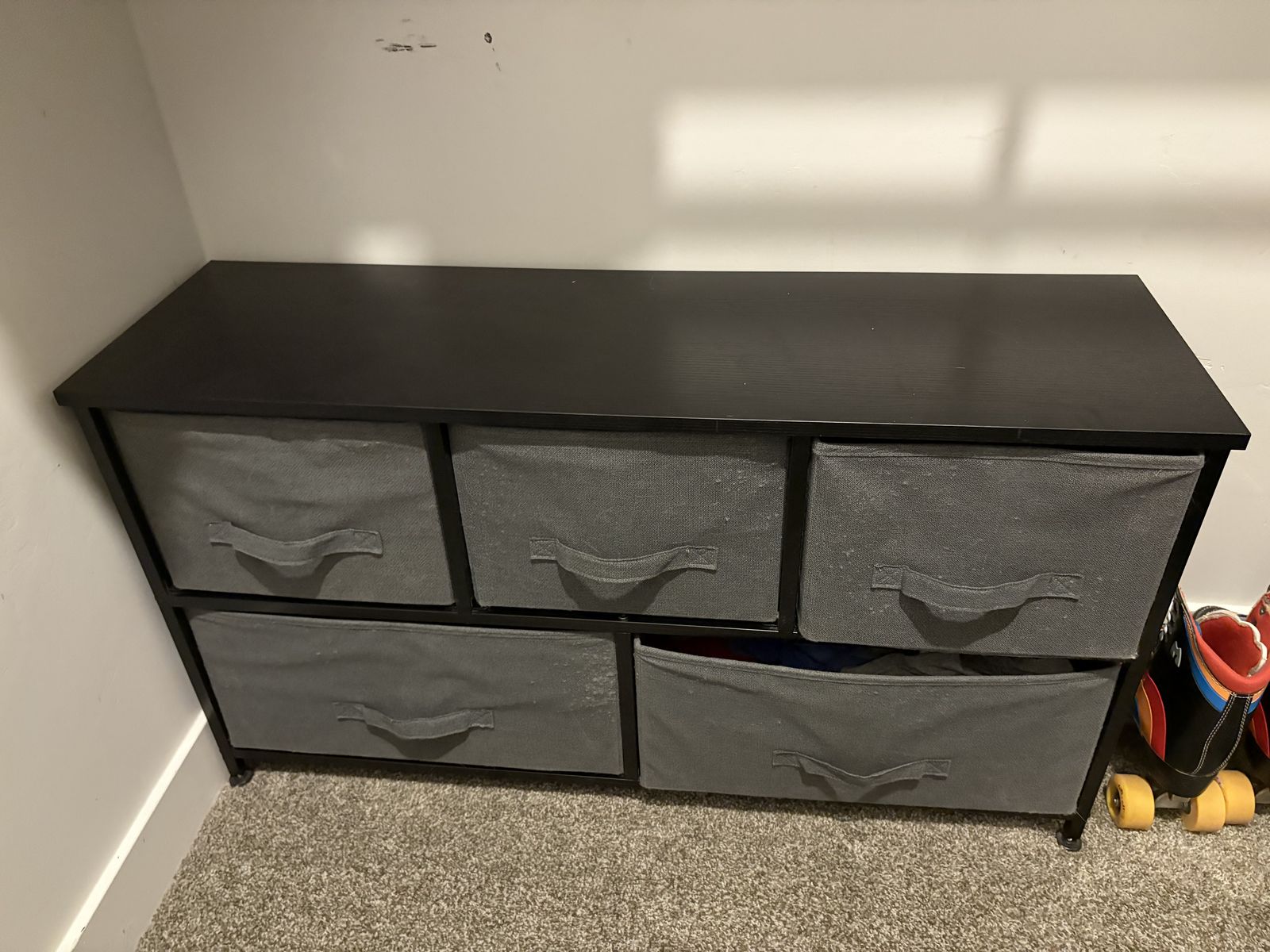 Black shelf bench with gray fabric boxes