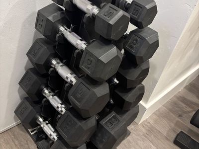 Dumbbells (5-30 set), bench, and kettlebell attachment
