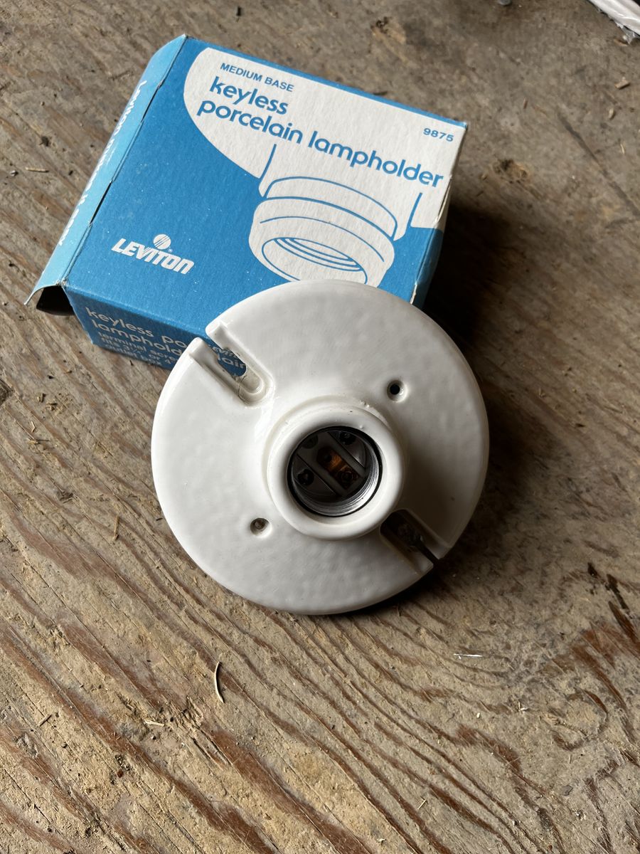 Porcelain Lightbulb Holder .50 Cents