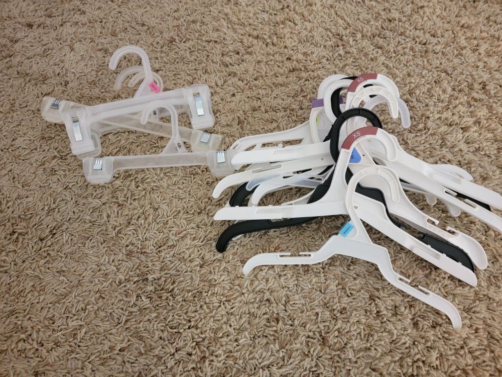 Assorted Plastic Clothing Hangers - baby and toddler sizes