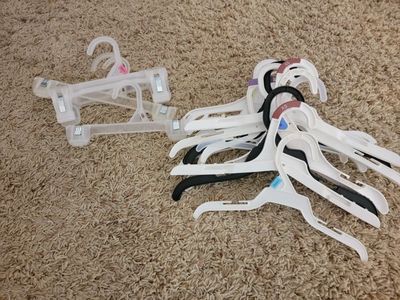 Assorted Plastic Clothing Hangers - baby and toddler sizes