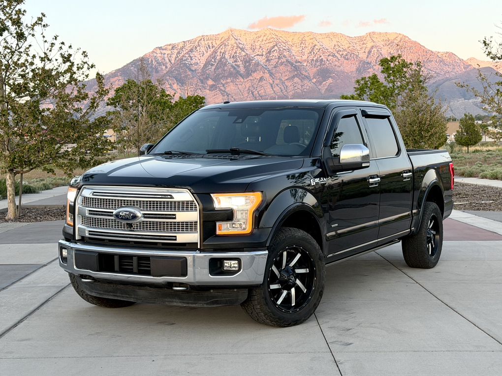 2015 Ford F-150 Supercrew — rebuilt & branded title, 7% below market