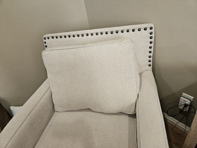 Beautiful extra large cream colored nailhead chair