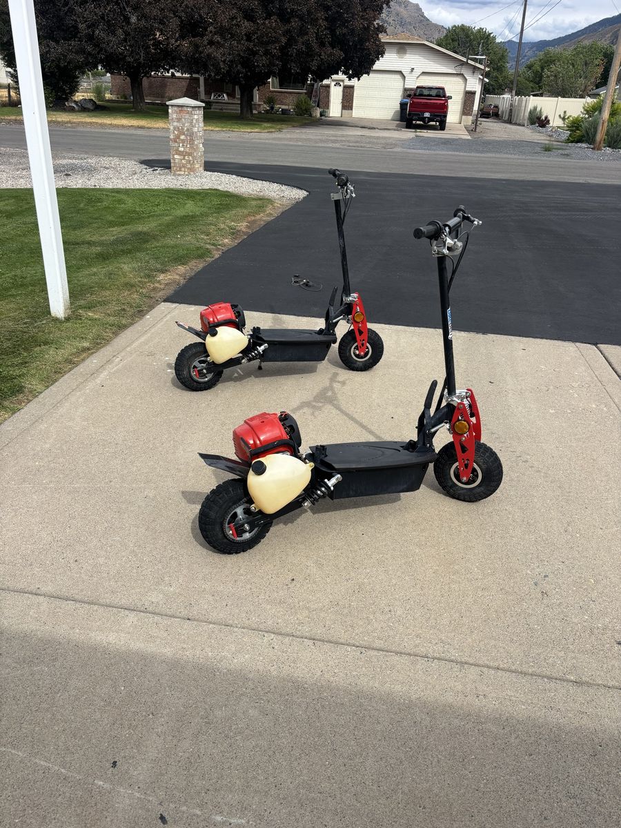 Full suspension, 39cc 4cycle gas powered scooters, foldable for easy transportation/ storage. $300 for the pair 435 760 3712