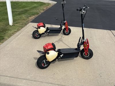 Full suspension, 39cc 4cycle gas powered scooters, foldable for easy transportation/ storage. $300 for the pair 435 760 3712
