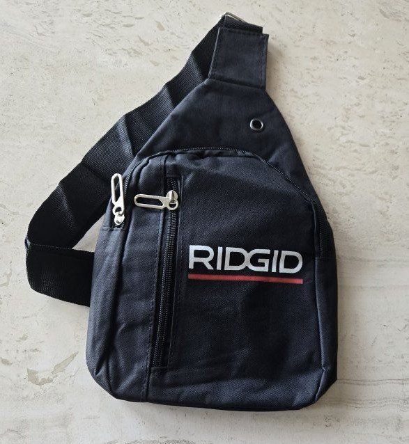 RIDGID Black Crossbody Sling Bag Shoulder Pack Zippered Pockets