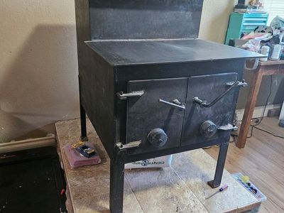 Vintage Heavy-Duty Black Steel Wood Burning Stove with Double Doors