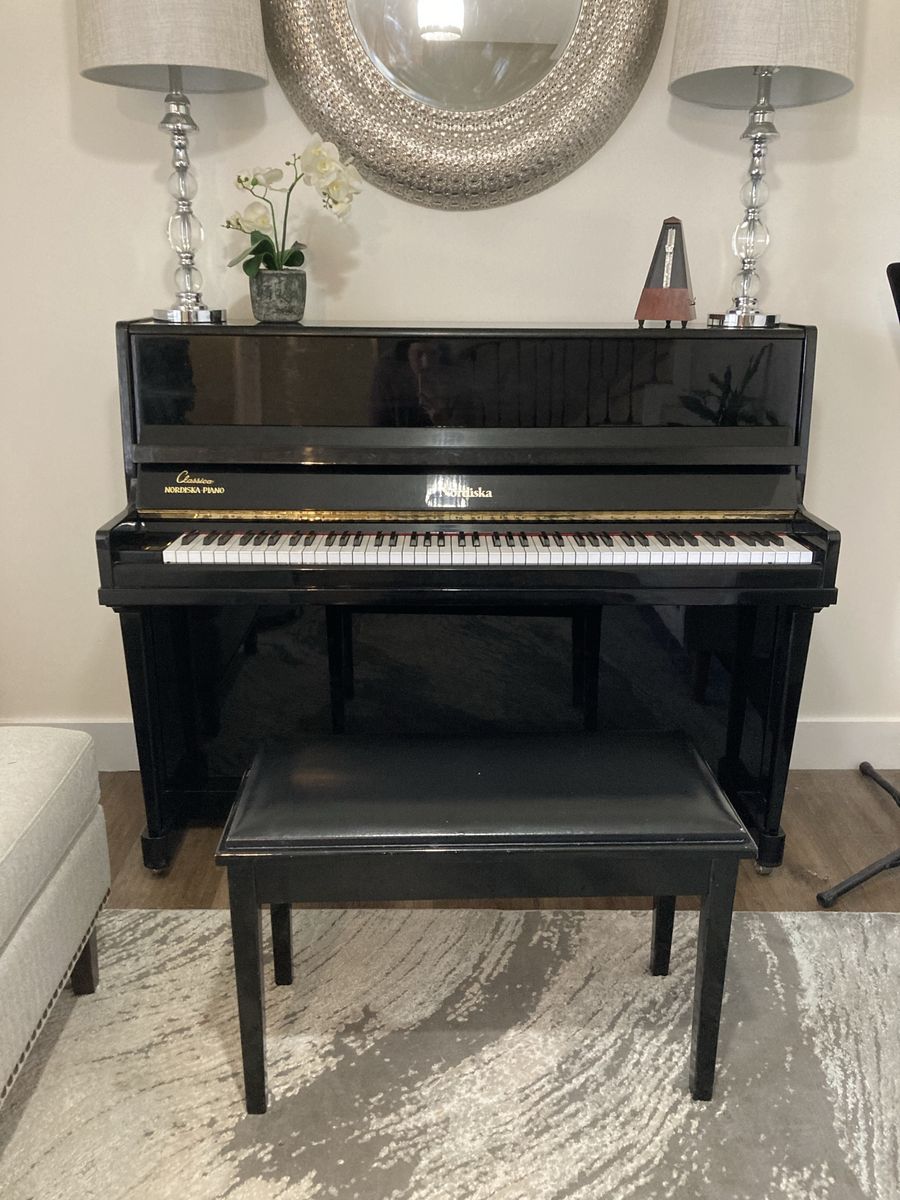 Shiny black piano with original finish