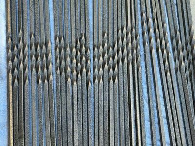 single twist iron balusters for stairs 37in x 1/2 dark brown powder coating