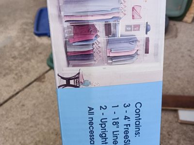 New in box Rubbermaid closet organizer.