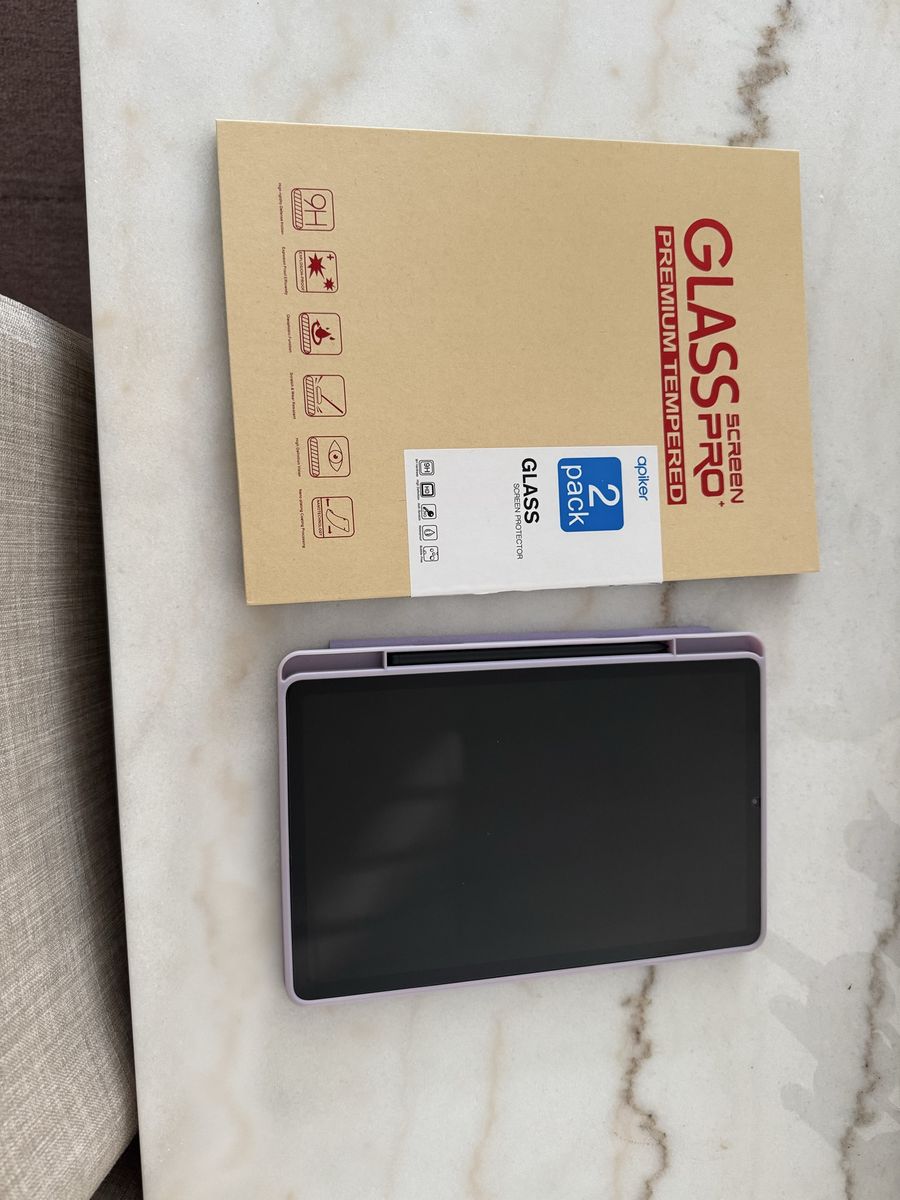 Samsung Galaxy tablet with screen protector, case, and stylus