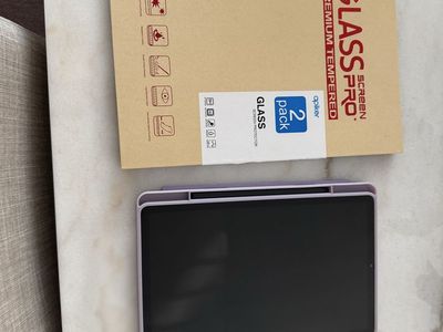 Samsung Galaxy tablet with screen protector, case, and stylus
