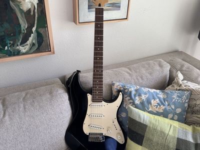 Yamaha EG303 “Strat” style electric guitar
