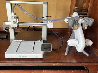 Bambu lab a1 combo 595 hours with a 0.2 nozzle and a 0.4 nozzle excellent condition