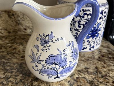 Blue and white pitcher