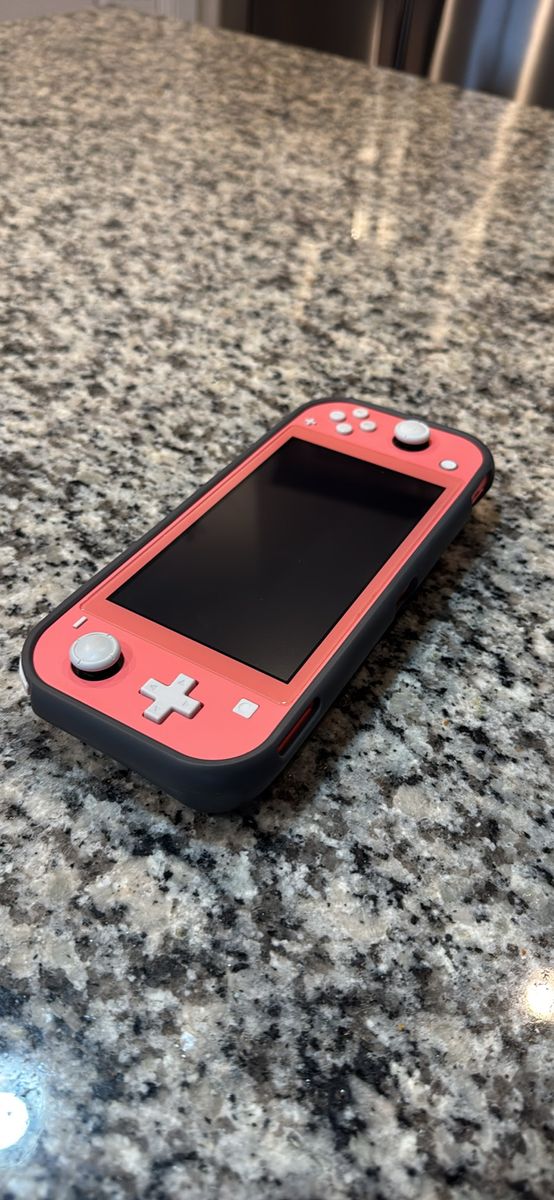 Coral nintendo switch lite