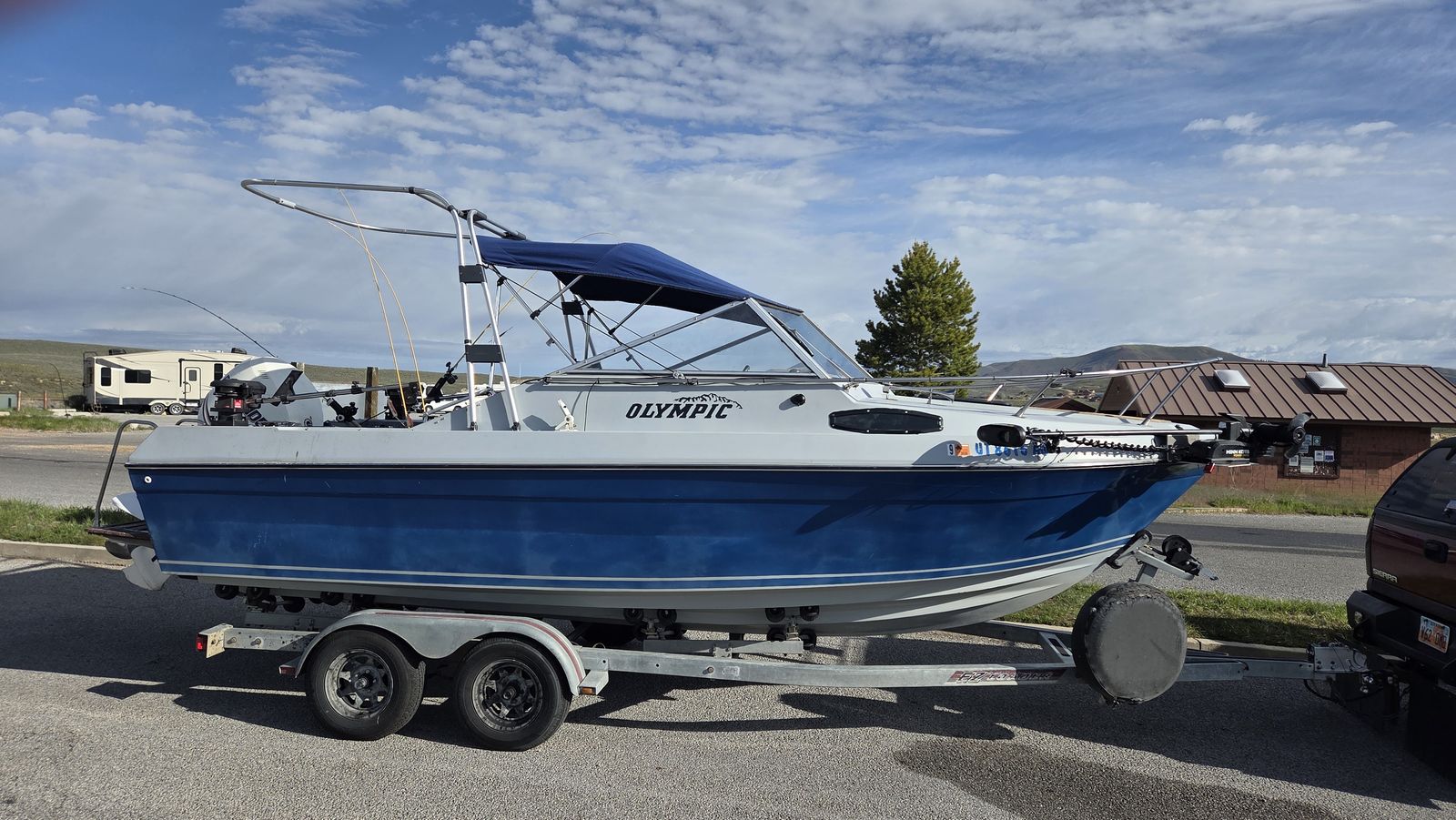 1989 Olympic Fisher/ Cuddy Cabin w/ 225 hp Outboard