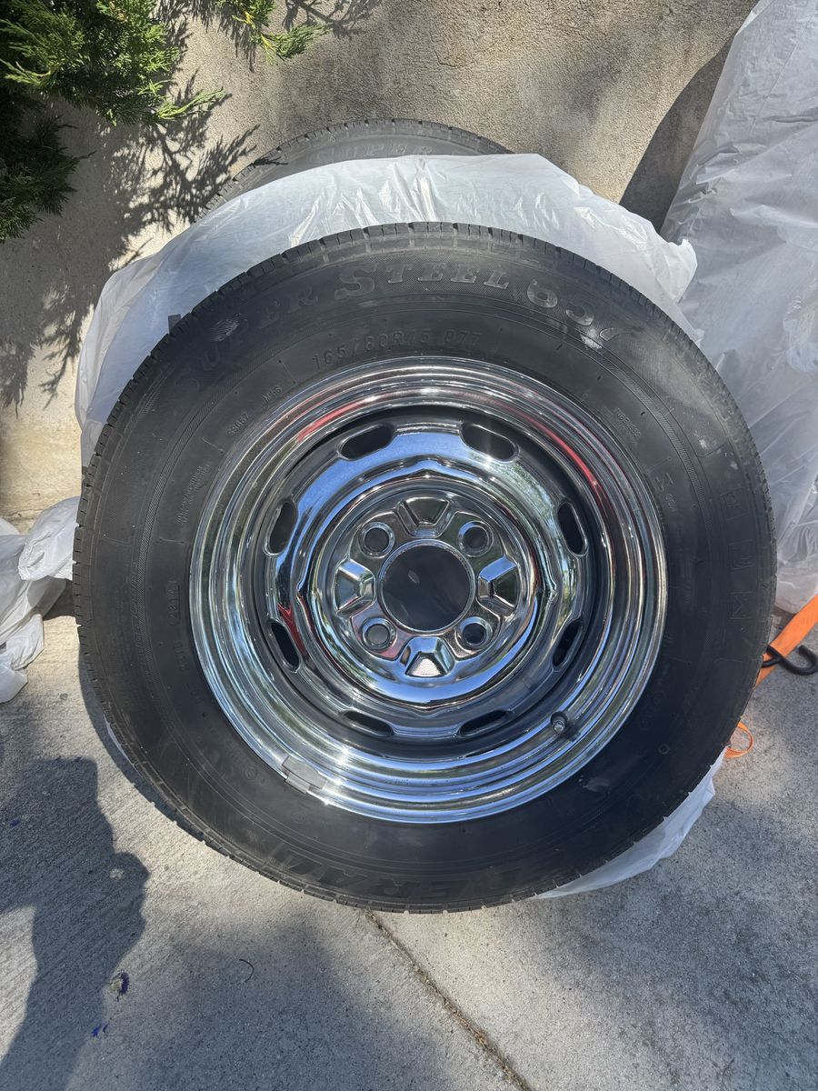 Four Tires with Wheels off a 71’ Beetle (year 2023)