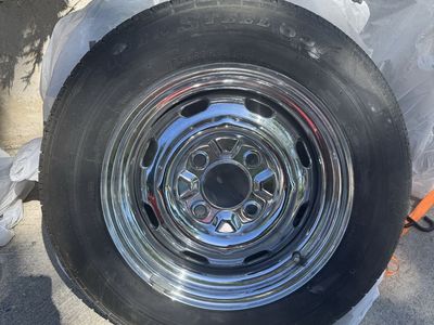 Four Tires with Wheels off a 71’ Beetle (year 2023)