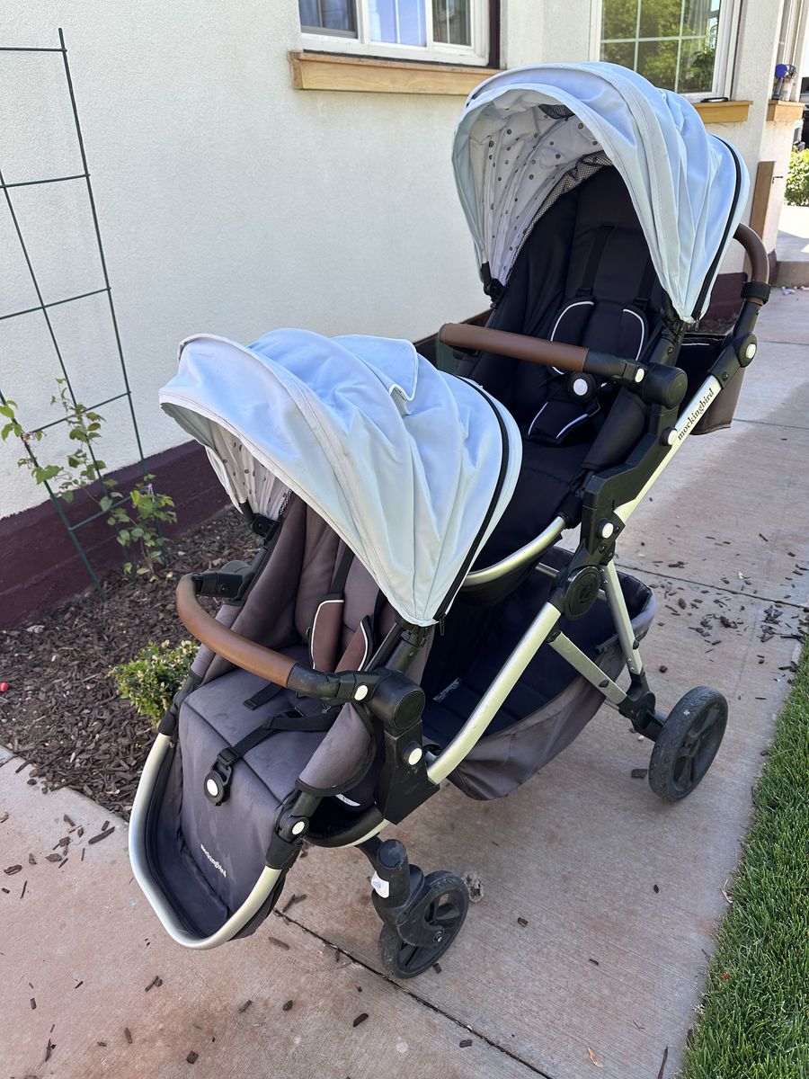 Mockingbird Single to Double Stroller with Matching Light Blue Canopies