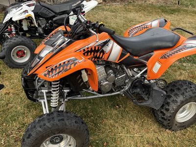 Two Atvs Predator 500 Kfx400