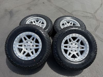 New Silver Dropstar TIS DTS602 265/70r17 Terramax AT2 6x5.5 Chevy Silverado Tacoma 6x135 Ford F150 6 lug DTS wheels and tires