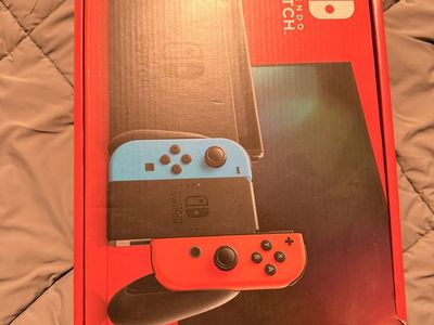Nintendo Switch Console with Neon Blue and Neon Red Joy-Cons (Boxed)