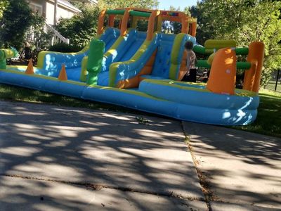 Joymore bounce house water slide with climbing wall and bb hoops