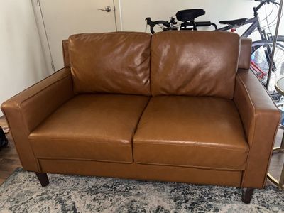 Faux leather loveseat (camel colored)