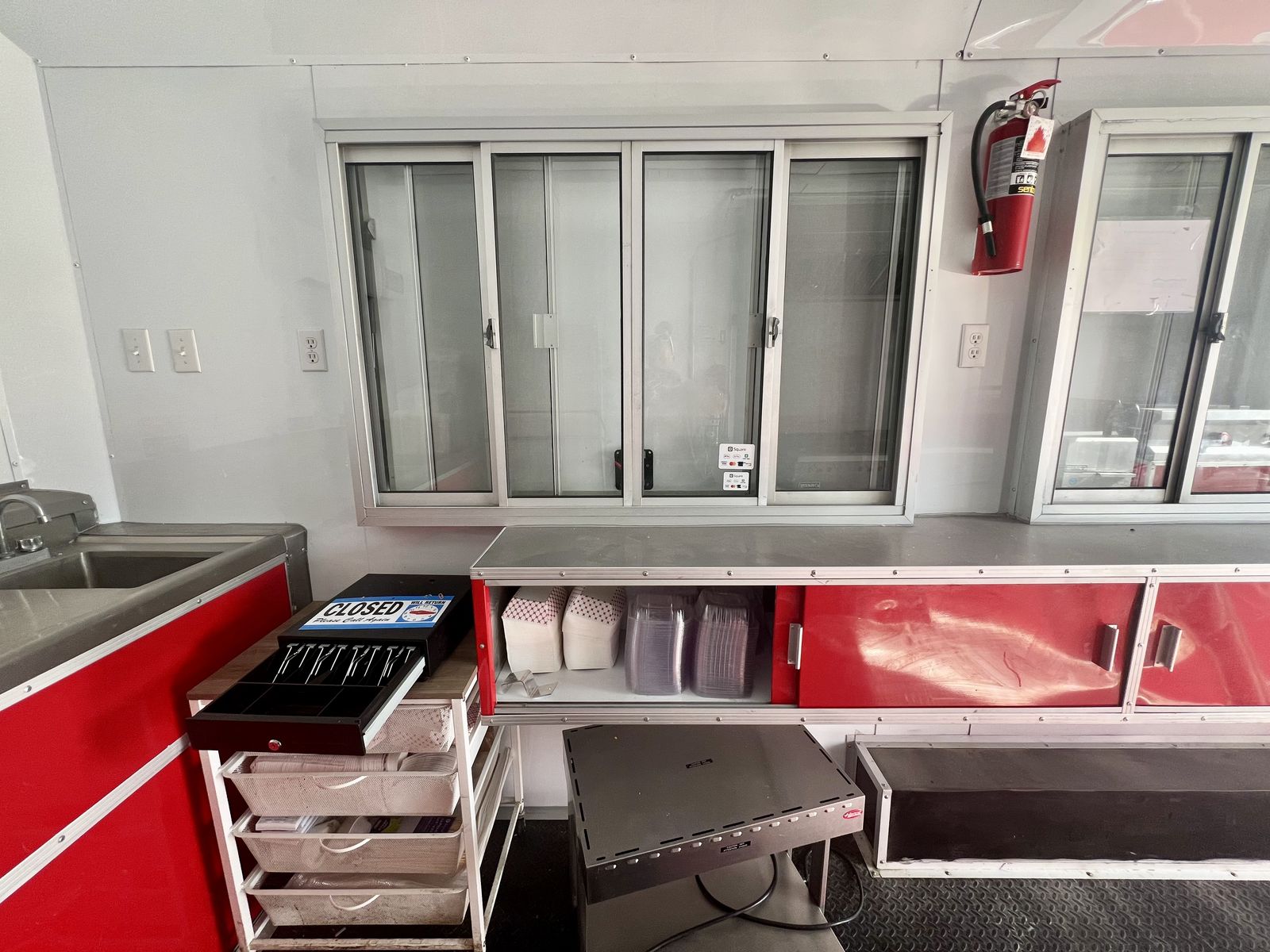 2023 Red Food Trailer - Flat Top Grill, Freezer, A/C, Fire Suppression, Equipment Included