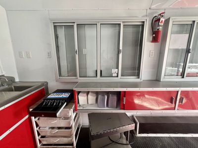 2023 Red Food Trailer - Flat Top Grill, Freezer, A/C, Fire Suppression, Equipment Included