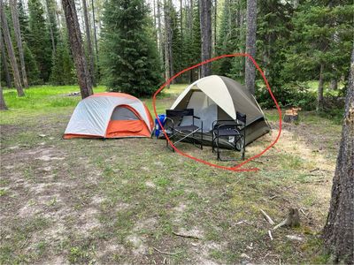 Coleman “4” man dome tent with fly and stakes.