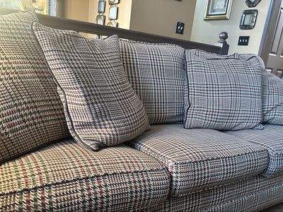 2-custom Ralph Lauren regular size couches made with down feathers. Comes with 4 used pillows and a bunch of never used pillows