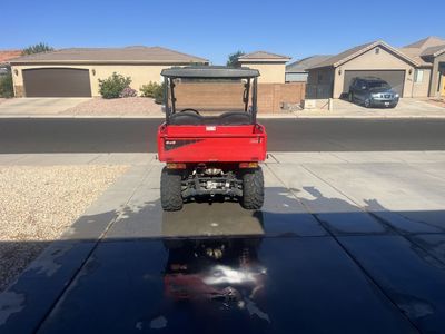 Red 4x4 UTV Side-by-Side Utility Vehicle with Dump Bed