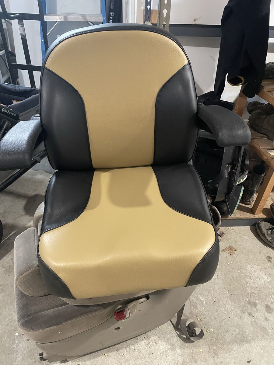 Riding mower seat